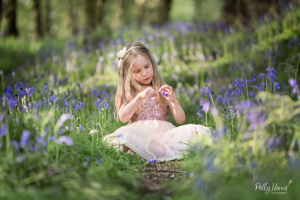 Girl counting bluebells
